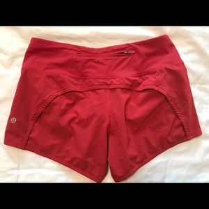Lululemon red 4” long shorts size 6